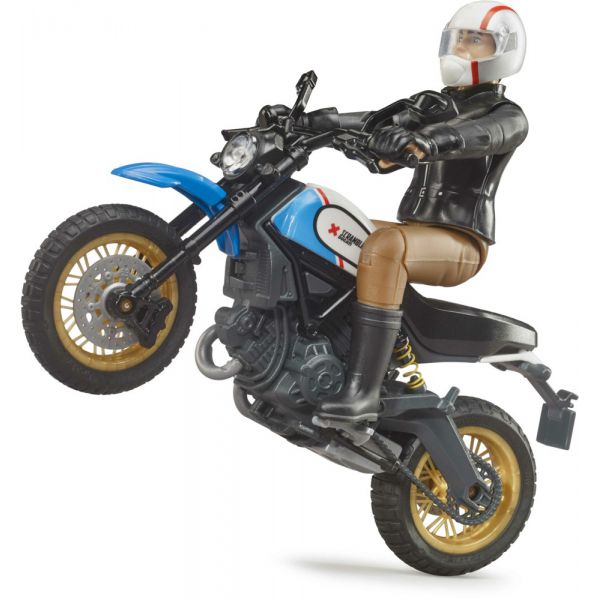 Ducati Scrambler Desert Sled motorcycle with rider